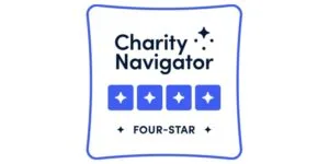 charity-navigator-Logo_2024-300x150jpg Charity Navigator four-star rating badge with five blue stars and text 'Charity Navigator' above 'FOUR-STAR'.
